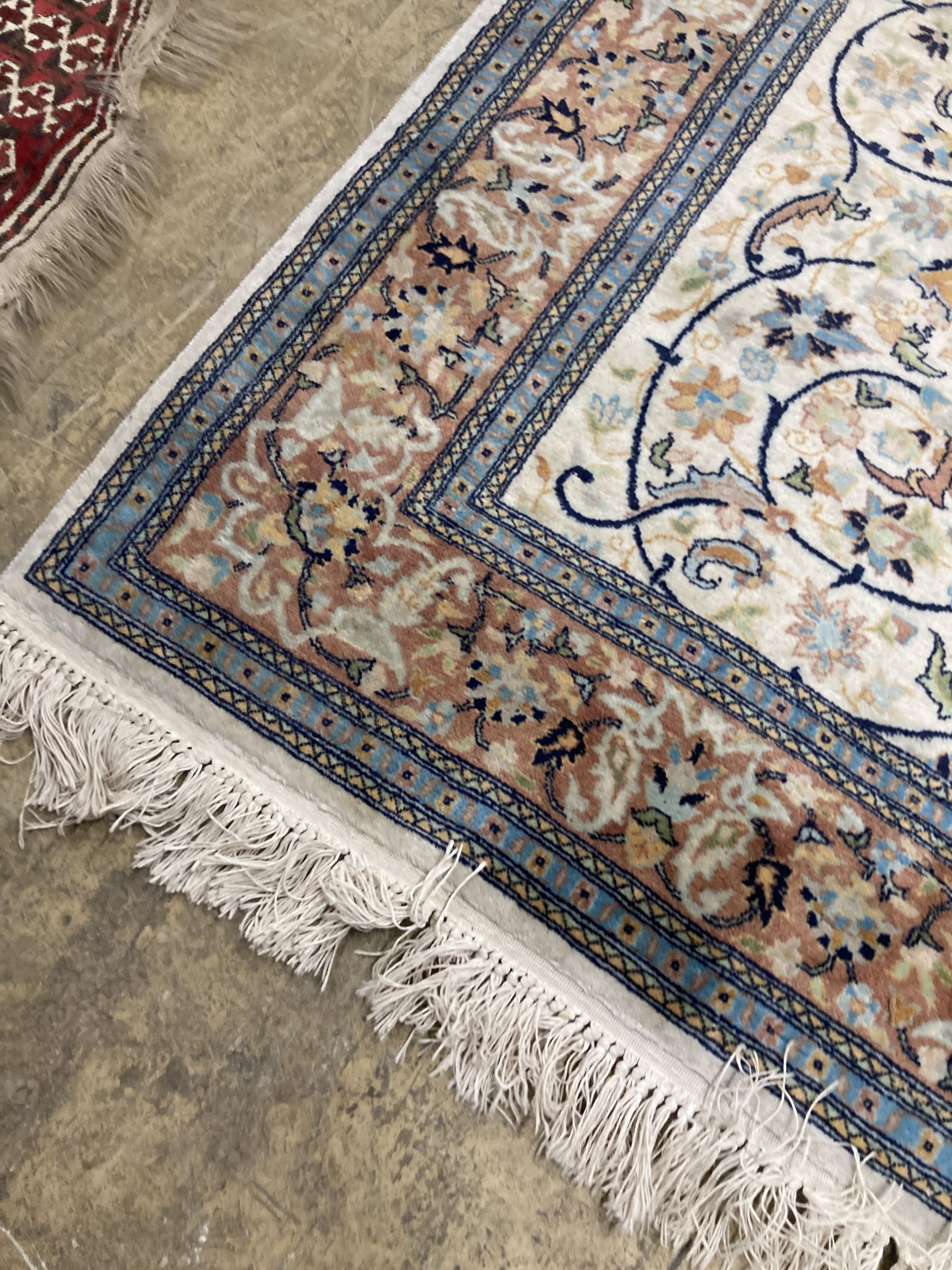 A North West Persian design ivory ground rug, 210 x 136cm